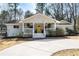 Charming home with a well-manicured lawn and a welcoming front porch at 1309 Arnold Ne Ave, Atlanta, GA 30324