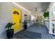 Inviting front porch features a bright yellow door and ample space for relaxing at 1309 Arnold Ne Ave, Atlanta, GA 30324
