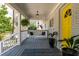 Cozy front porch with a swing, plants, and a view of the surrounding neighborhood at 1309 Arnold Ne Ave, Atlanta, GA 30324