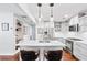 Modern kitchen with stainless steel appliances, white cabinetry, and a large center island at 1309 Arnold Ne Ave, Atlanta, GA 30324