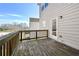 Wooden back deck with a view, perfect for outdoor entertaining and relaxing at 1566 Wilson Manor Cir, Lawrenceville, GA 30045