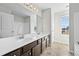 Bathroom featuring double vanity, modern fixtures, and tile floors for a clean, updated look at 1566 Wilson Manor Cir, Lawrenceville, GA 30045