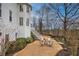 Landscaped backyard featuring a fire pit area, perfect for enjoying cool evenings outdoors at 3534 Brandywine Nw Rd, Kennesaw, GA 30144