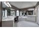 Lavish bathroom with soaking tub, dual sinks, vanity area and mirrors that enhance the room's openness at 3534 Brandywine Nw Rd, Kennesaw, GA 30144