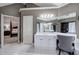 Bathroom featuring a vanity area and ensuite access to the bedroom, tub and walk-in shower at 3534 Brandywine Nw Rd, Kennesaw, GA 30144