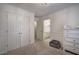 Cozy bedroom with plush carpet, closet, ensuite bathroom, white trim, and decorative chandelier at 3534 Brandywine Nw Rd, Kennesaw, GA 30144