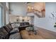 Spacious living room features a high ceiling, staircase, and an open view to the kitchen area at 3534 Brandywine Nw Rd, Kennesaw, GA 30144