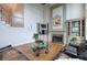 Inviting living room showcasing a fireplace, built-ins, and comfortable seating, offering a cozy space for relaxation at 3534 Brandywine Nw Rd, Kennesaw, GA 30144