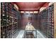 Spacious wine cellar with a table, wine racks, and storage for wine collections at 3534 Brandywine Nw Rd, Kennesaw, GA 30144