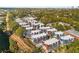 An aerial view of a modern townhome community surrounded by mature trees and green spaces at 383 Pratt Se Dr # 503, Atlanta, GA 30315