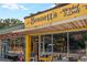 Vibrant exterior of Bennett's Market & Deli featuring colorful signage and storefront displaying local charm and character at 383 Pratt Se Dr # 503, Atlanta, GA 30315