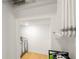 View into open closet with metal shelving and drying rack at 383 Pratt Se Dr # 503, Atlanta, GA 30315