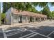 Corner commercial building with a red tile roof, large windows, and convenient street access, ideal for retail or office space at 383 Pratt Se Dr # 503, Atlanta, GA 30315