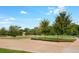 A spacious community park with lush green spaces and mature trees, perfect for outdoor activities and relaxation at 383 Pratt Se Dr # 503, Atlanta, GA 30315