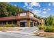 Modern commercial building with wood and steel accents, visible signage, and ample parking at 383 Pratt Se Dr # 503, Atlanta, GA 30315