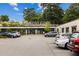 Artist Cove exterior with plentiful parking on a sunny day at 383 Pratt Se Dr # 503, Atlanta, GA 30315