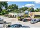 Charming mixed-use exterior featuring multiple businesses and ample parking at 383 Pratt Se Dr # 503, Atlanta, GA 30315