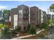 Modern building exterior showing a mix of brick and metal, set among trees, with well-maintained landscaping at 383 Pratt Se Dr # 503, Atlanta, GA 30315