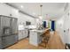 Contemporary kitchen featuring an island with barstool seating and stainless steel appliances at 383 Pratt Se Dr # 503, Atlanta, GA 30315