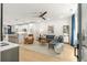 Contemporary open concept living area with hardwood floors and stylish decor flowing into the kitchen at 383 Pratt Se Dr # 503, Atlanta, GA 30315