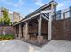 Under the pavilion is an outdoor kitchen with counter seating and charcoal grills for entertaining at 383 Pratt Se Dr # 503, Atlanta, GA 30315