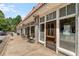 Charming storefront featuring large windows, a sidewalk, and outdoor seating, creating an inviting and attractive commercial space at 383 Pratt Se Dr # 503, Atlanta, GA 30315