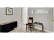 Bedroom featuring wood-look floors, neutral walls, and closet at 1351 Eason Nw St, Atlanta, GA 30314