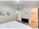 Bedroom featuring wood-look floors, neutral walls, and a doorway leading to closet at 1351 Eason Nw St, Atlanta, GA 30314