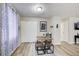 Cozy dining area featuring a wooden table and hardwood floors at 1351 Eason Nw St, Atlanta, GA 30314