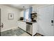 Modern kitchen with white cabinets and stainless steel appliances at 1351 Eason Nw St, Atlanta, GA 30314