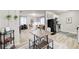 Open-concept living space with a dining area and modern kitchen at 1351 Eason Nw St, Atlanta, GA 30314