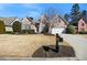 Beautiful two-story brick home with a well-maintained lawn and attached two car garage at 1462 Valley Glen Way, Dunwoody, GA 30338