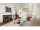 Spacious living room with fireplace, staircase, and modern decor at 1462 Valley Glen Way, Dunwoody, GA 30338