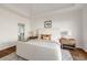 Bright main bedroom with hardwood floors and neutral decor at 1462 Valley Glen Way, Dunwoody, GA 30338