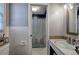 Clean bathroom features tiled walls, mosaic tile floors, and vanity at 224 E Felton Rd, Cartersville, GA 30121