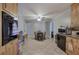 Spacious kitchen with dining area featuring wood cabinets and tile flooring at 224 E Felton Rd, Cartersville, GA 30121