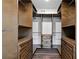 A walk-in closet with custom storage and shelving at 2316 Miriam Ln, Decatur, GA 30032