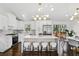 Bright kitchen featuring white cabinets, a large island, and stainless steel appliances at 2316 Miriam Ln, Decatur, GA 30032