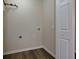 Small utility room with connections for appliances and a single door at 2775 Capri Dr, Cumming, GA 30041