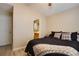 Bedroom with dark bed and bathroom access at 2800 Barnwood Xing, Duluth, GA 30097