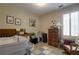 Well-lit Bedroom features neutral colors and a wooden crib at 2800 Barnwood Xing, Duluth, GA 30097