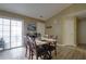 Dining area with light wood floors and patio access at 2800 Barnwood Xing, Duluth, GA 30097