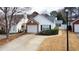 Charming one-story home with a brick-accented garage and neatly maintained landscaping at 2800 Barnwood Xing, Duluth, GA 30097