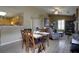 Inviting living and dining area featuring wood floors, neutral walls, and modern decor at 2800 Barnwood Xing, Duluth, GA 30097