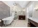 Bright bathroom featuring a soaking tub, glass shower, and decorative mosaic tile at 65 Gatewood Dr, Marietta, GA 30068