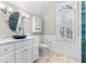 Bright bathroom with marble countertops, vessel sink, white cabinetry, and natural light at 65 Gatewood Dr, Marietta, GA 30068