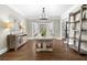 Elegant dining room with hardwood floors, bay windows, and decorative shelving at 65 Gatewood Dr, Marietta, GA 30068