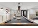 Well-lit game room with a pool table, dark-framed glass doors, and custom shelving at 65 Gatewood Dr, Marietta, GA 30068