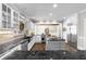 Spacious updated kitchen boasts stainless appliances, granite countertops, island, and hardwood floors at 65 Gatewood Dr, Marietta, GA 30068