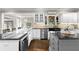 Updated kitchen featuring granite countertops, stainless steel appliances and open floorplan at 65 Gatewood Dr, Marietta, GA 30068